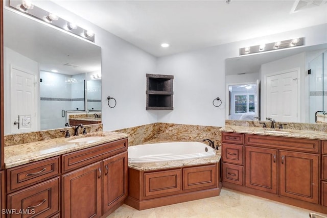 401 Bayfront Pl Unit 3301, Naples, FL 34102 - bathroom with a stall shower, two vanities, and a garden tub