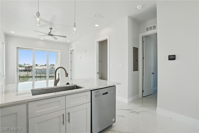 855 Lagoon St Unit 3, Fort Myers Beach, FL 33931 - kitchen featuring stainless steel dishwasher, a sink, baseboards, recessed lighting, and white cabinets