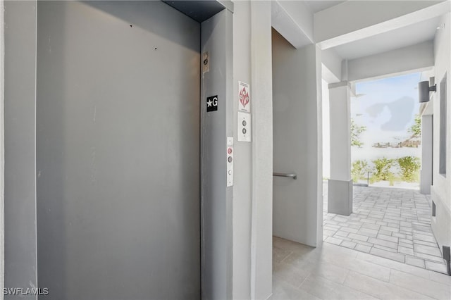855 Lagoon St Unit 3, Fort Myers Beach, FL 33931 - hallway with elevator