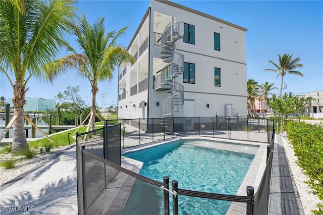 855 Lagoon St Unit 4, Fort Myers Beach, FL 33931 - view of pool with stairs