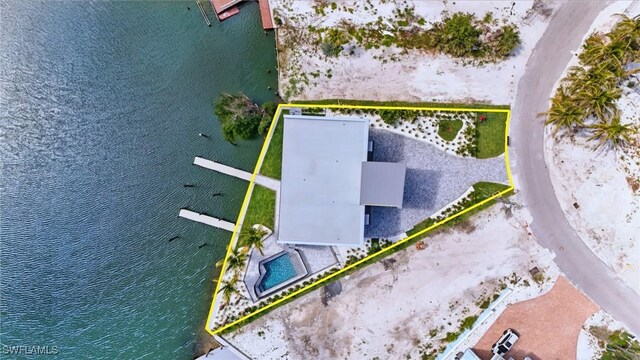 855 Lagoon St Unit 4, Fort Myers Beach, FL 33931 - aerial view of property and surrounding area featuring property boundaries highlighted, a nearby body of water, and a pool