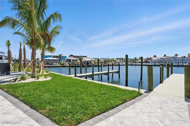 855 Lagoon St Unit 4, Fort Myers Beach, FL 33931 - dock featuring a yard and a water view