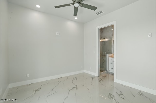 855 Lagoon St Unit 4, Fort Myers Beach, FL 33931 - unfurnished bedroom featuring baseboards, recessed lighting, light marble finish floors, and ensuite bathroom