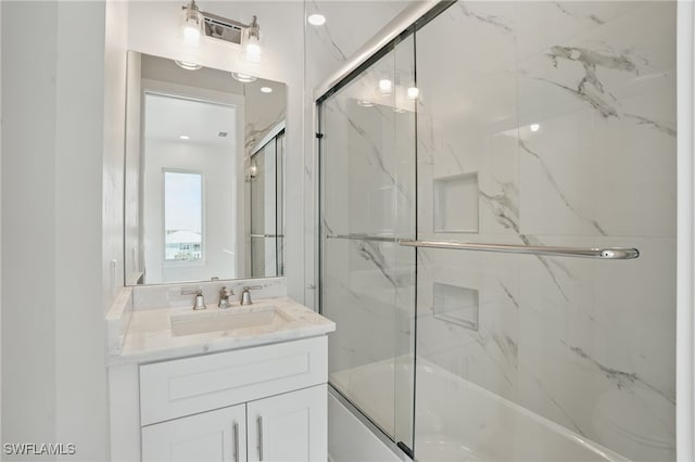 855 Lagoon St Unit 4, Fort Myers Beach, FL 33931 - bathroom featuring combined bath / shower with glass door and vanity
