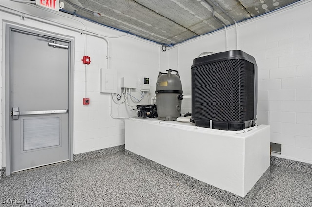 855 Lagoon St Unit 4, Fort Myers Beach, FL 33931 - misc room with speckled floor and concrete block wall