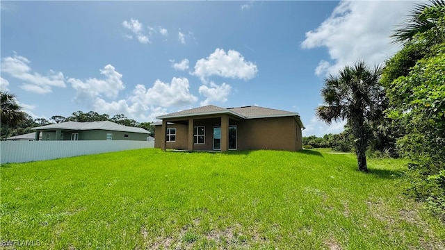1115 Leader St, Labelle, FL 33935 - back of property featuring stucco siding