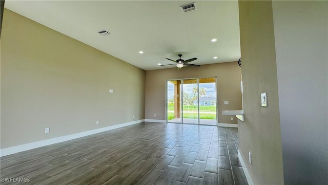 1115 Leader St, Labelle, FL 33935 - unfurnished room featuring baseboards, ceiling fan, dark wood-style floors, and recessed lighting