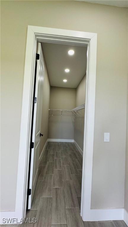 1115 Leader St, Labelle, FL 33935 - walk in closet with wood tiled floors