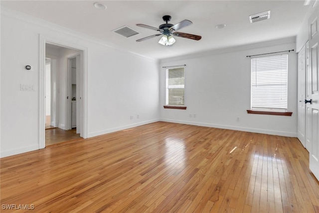 2940 14th Ave SE, Naples, FL 34117 - unfurnished room with light wood-type flooring, ceiling fan, and crown molding