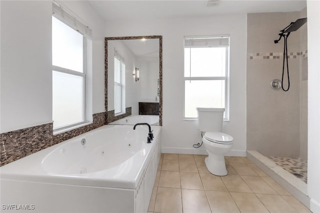 2940 14th Ave SE, Naples, FL 34117 - full bath featuring a whirlpool tub, a tile shower, and tile patterned floors