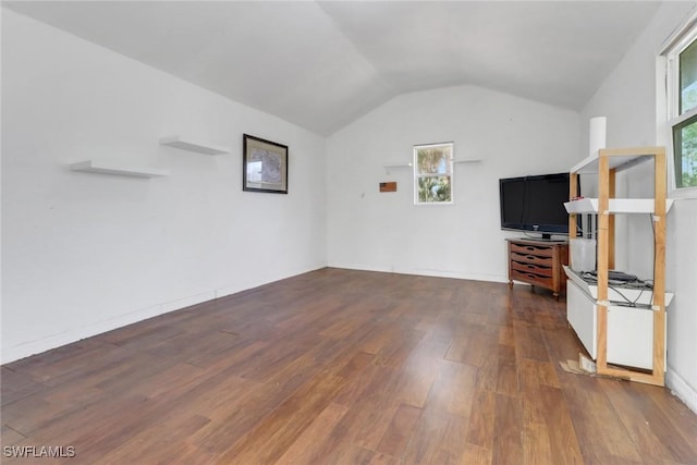 2940 14th Ave SE, Naples, FL 34117 - unfurnished living room with dark wood finished floors and lofted ceiling