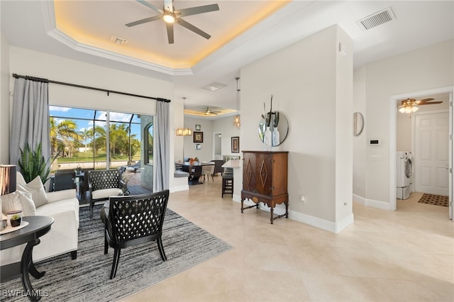 1206 SW 18th Ave, Cape Coral, FL 33991 - living room with ceiling fan, washer / dryer, and baseboards