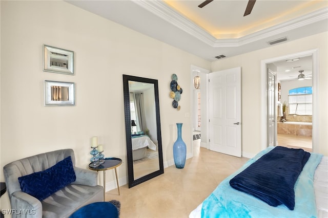 1206 SW 18th Ave, Cape Coral, FL 33991 - bedroom with baseboards, ceiling fan, ornamental molding, ensuite bath, and a raised ceiling