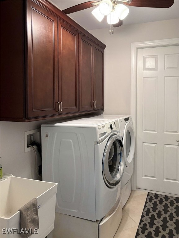 1206 SW 18th Ave, Cape Coral, FL 33991 - laundry room with washer and dryer, cabinet space, a ceiling fan, and light tile patterned flooring