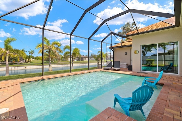 1206 SW 18th Ave, Cape Coral, FL 33991 - outdoor pool with a patio area, a water view, and a lanai