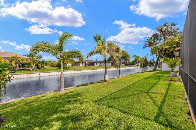 1206 SW 18th Ave, Cape Coral, FL 33991 - view of grassy yard featuring a water view