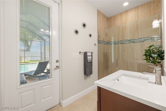 1206 SW 18th Ave, Cape Coral, FL 33991 - full bath with vanity, tiled shower, baseboards, and recessed lighting