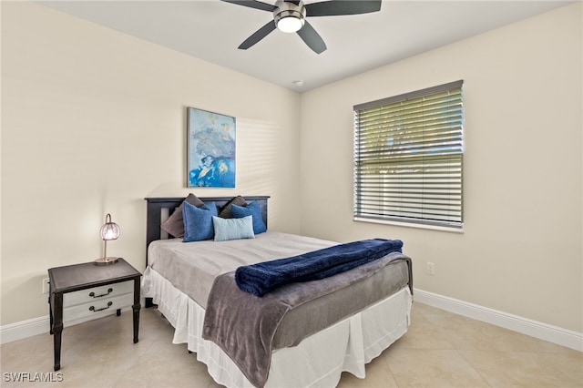 1206 SW 18th Ave, Cape Coral, FL 33991 - tiled bedroom with baseboards and ceiling fan
