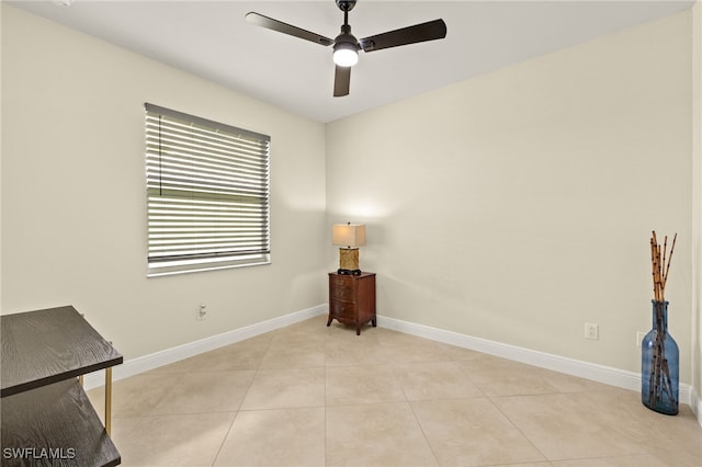 1206 SW 18th Ave, Cape Coral, FL 33991 - spare room with a ceiling fan, baseboards, and light tile patterned floors