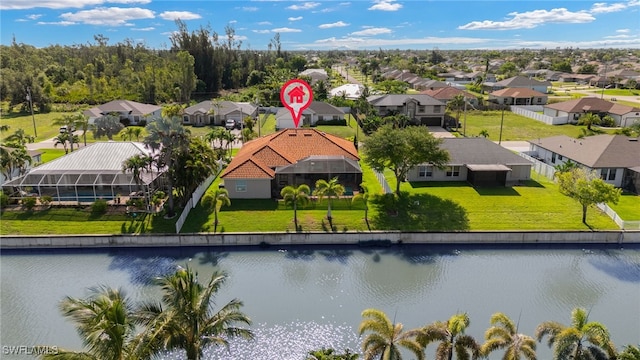 1206 SW 18th Ave, Cape Coral, FL 33991 - aerial view of residential area featuring a nearby body of water