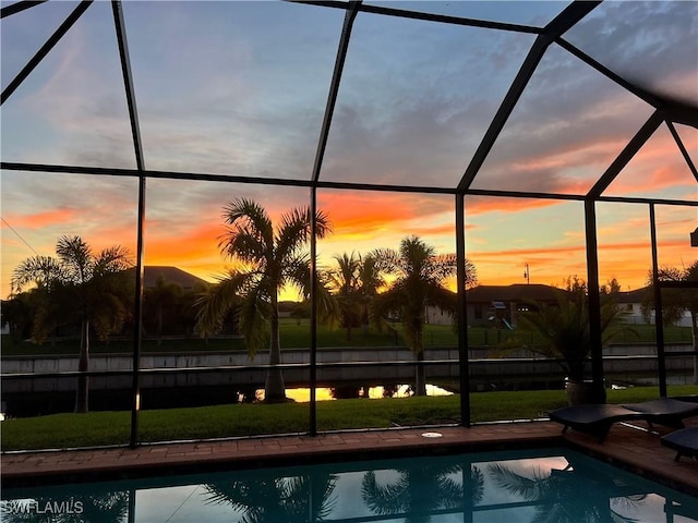 1206 SW 18th Ave, Cape Coral, FL 33991 - swimming pool featuring a lanai and a patio