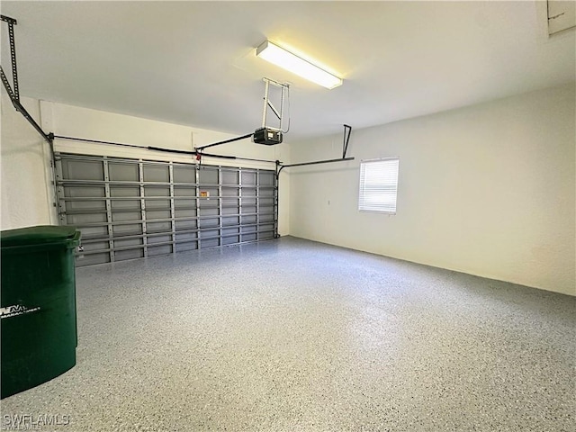 8088 Sanctuary Dr Unit 1, Naples, FL 34104 - garage featuring a garage door opener