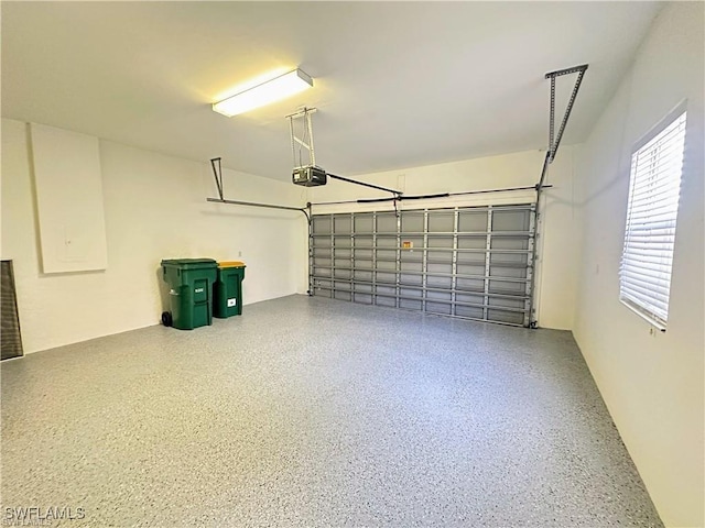 8088 Sanctuary Dr Unit 1, Naples, FL 34104 - garage with a garage door opener