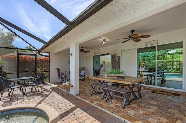 907 SE 19th Ter, Cape Coral, FL 33990 - view of patio / terrace featuring outdoor dining space, a ceiling fan, an outdoor pool, and glass enclosure