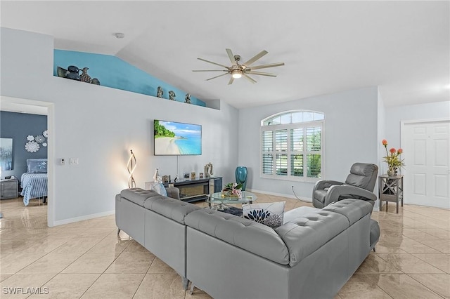 907 SE 19th Ter, Cape Coral, FL 33990 - living area featuring lofted ceiling, a ceiling fan, and light tile patterned floors