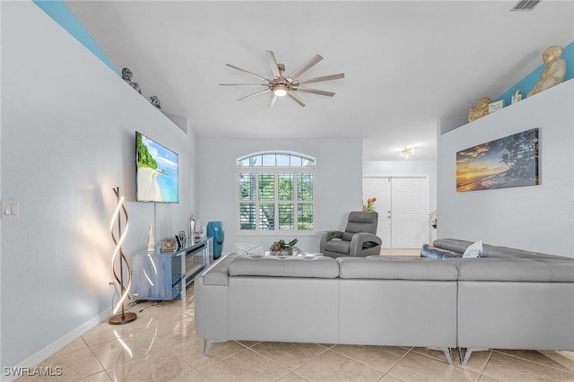907 SE 19th Ter, Cape Coral, FL 33990 - living room featuring a ceiling fan and vaulted ceiling