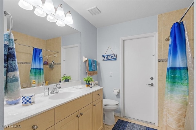 907 SE 19th Ter, Cape Coral, FL 33990 - bathroom featuring vanity, tile patterned floors, and a tile shower