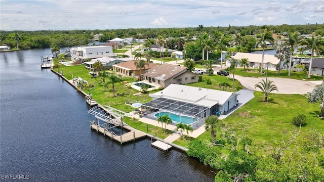 399 Grenier Dr, North Fort Myers, FL 33903 - aerial perspective of suburban area with a nearby body of water