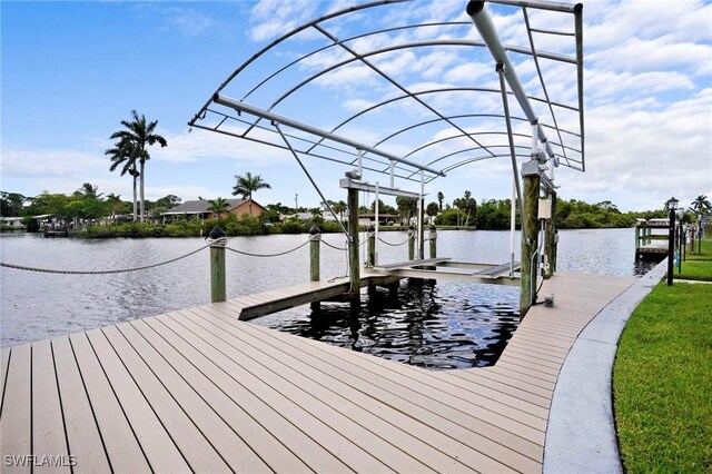 399 Grenier Dr, North Fort Myers, FL 33903 - dock area featuring boat lift and a water view