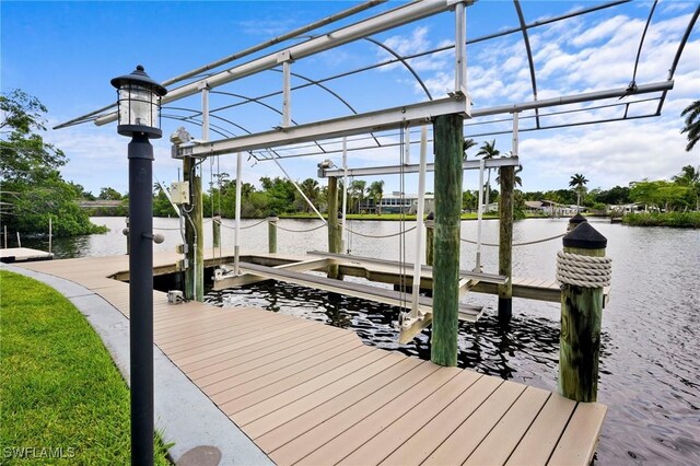399 Grenier Dr, North Fort Myers, FL 33903 - dock area with boat lift and a water view