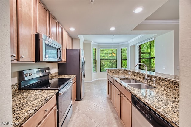 13751 Julias Way Unit 414, Fort Myers, FL 33919 - kitchen with appliances with stainless steel finishes, a sink, ornamental molding, light stone countertops, and light tile patterned floors