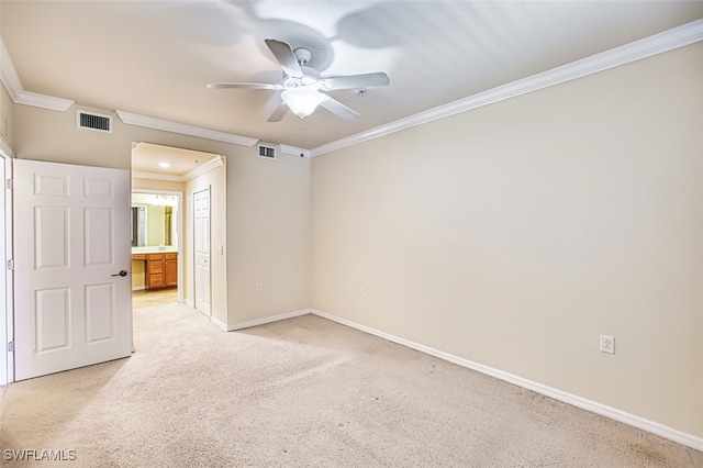 13751 Julias Way Unit 414, Fort Myers, FL 33919 - unfurnished room with a ceiling fan, crown molding, light carpet, and baseboards