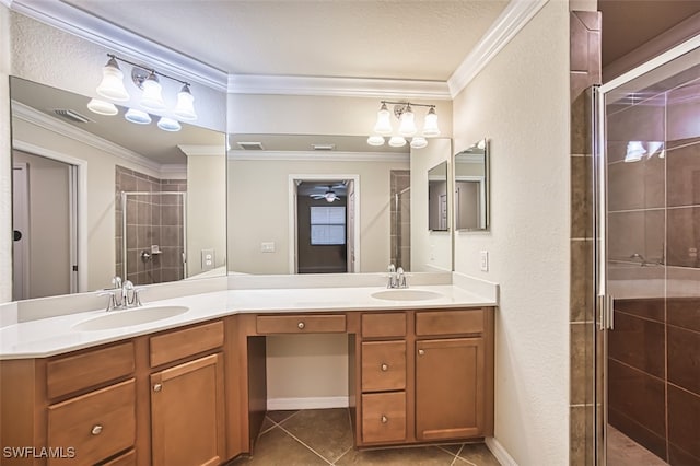 13751 Julias Way Unit 414, Fort Myers, FL 33919 - full bathroom featuring double vanity, tile patterned flooring, a stall shower, ornamental molding, and ceiling fan