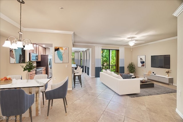 13751 Julias Way Unit 414, Fort Myers, FL 33919 - living area featuring a chandelier, ornamental molding, light tile patterned floors, baseboards, and a ceiling fan