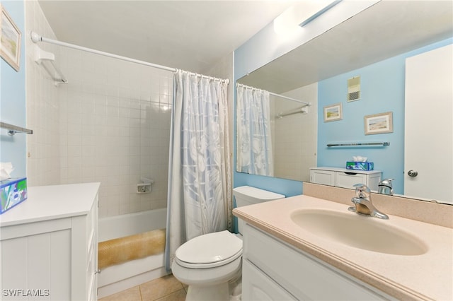 3460 N Key Dr Unit 409, North Fort Myers, FL 33903 - full bath with vanity, toilet, shower / tub combo with curtain, and tile patterned flooring