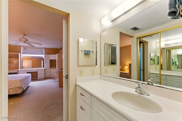 3460 N Key Dr Unit 409, North Fort Myers, FL 33903 - ensuite bathroom featuring vanity and ceiling fan