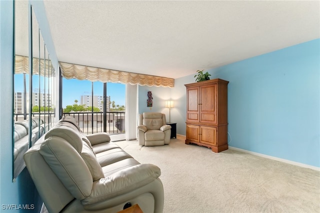 3460 N Key Dr Unit 409, North Fort Myers, FL 33903 - living room featuring light colored carpet and baseboards