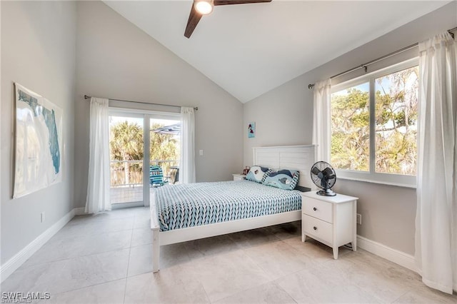 785 Rabbit Rd, Sanibel, FL 33957 - bedroom featuring access to exterior, multiple windows, baseboards, vaulted ceiling, and light tile patterned flooring