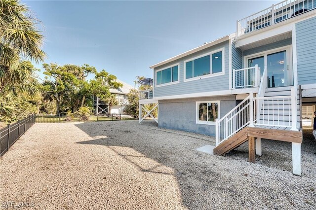785 Rabbit Rd, Sanibel, FL 33957 - rear view of property with stairway