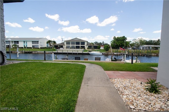 4014 Coronado Pkwy Unit 106, Cape Coral, FL 33904 - water view with a boat dock, nearby suburban area, and boat lift