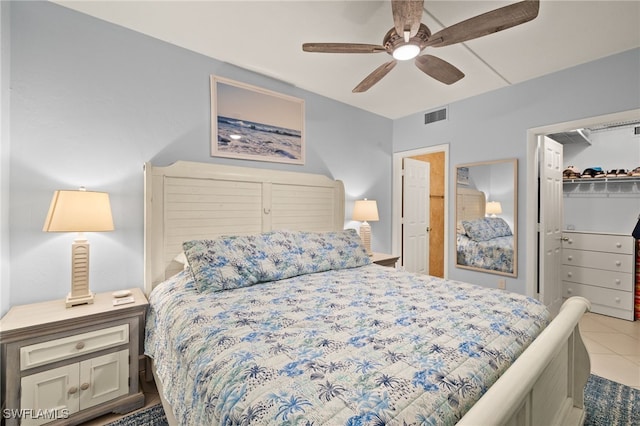 1920 Virginia Ave Unit 102, Fort Myers, FL 33901 - tiled bedroom featuring ceiling fan and a walk in closet