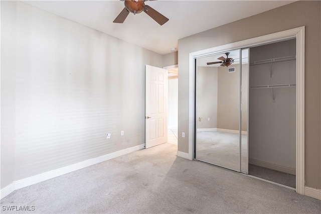 793 Regency Reserve Cir Unit 4501, Naples, FL 34119 - unfurnished bedroom with a closet, carpet floors, and ceiling fan