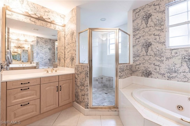 793 Regency Reserve Cir Unit 4501, Naples, FL 34119 - bathroom with healthy amount of natural light, a shower stall, a jetted tub, and wallpapered walls