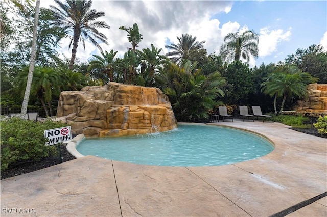 793 Regency Reserve Cir Unit 4501, Naples, FL 34119 - swimming pool with a patio area