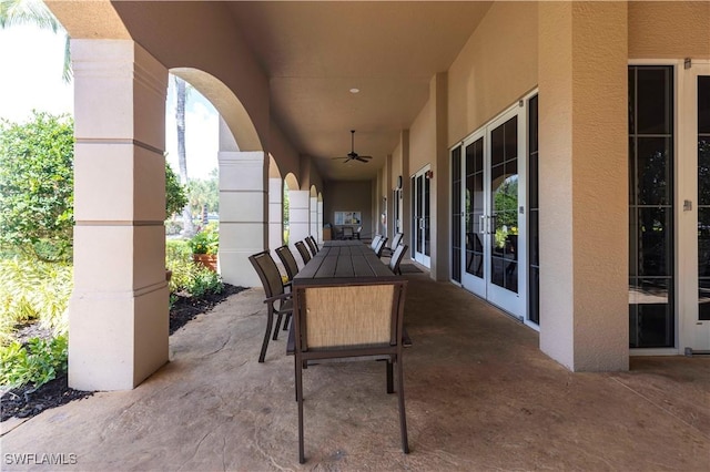 793 Regency Reserve Cir Unit 4501, Naples, FL 34119 - view of patio with outdoor dining area and a ceiling fan