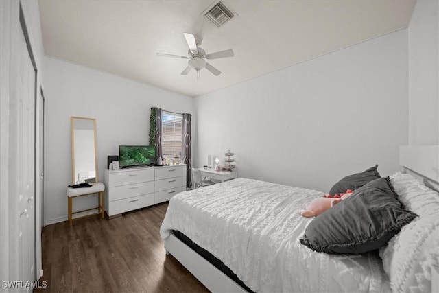 20025 Lake Vista Cir Unit 6B, Lehigh Acres, FL 33936 - bedroom with dark wood finished floors and a ceiling fan